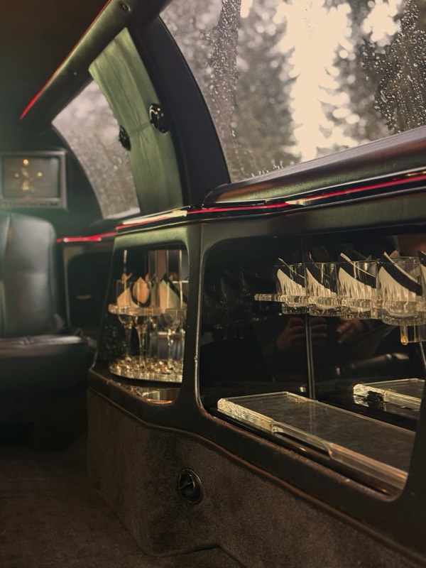 The bar console inside the Lockwood Luxury limousine, stocked with glassware